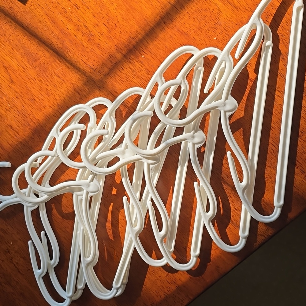 9 Plastic White Baby Hangers -VGUC